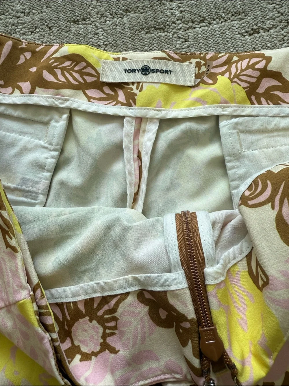 Tory Burch Tory Sport Printed Ruffle Golf Skort in French Crème Bouquet Pink